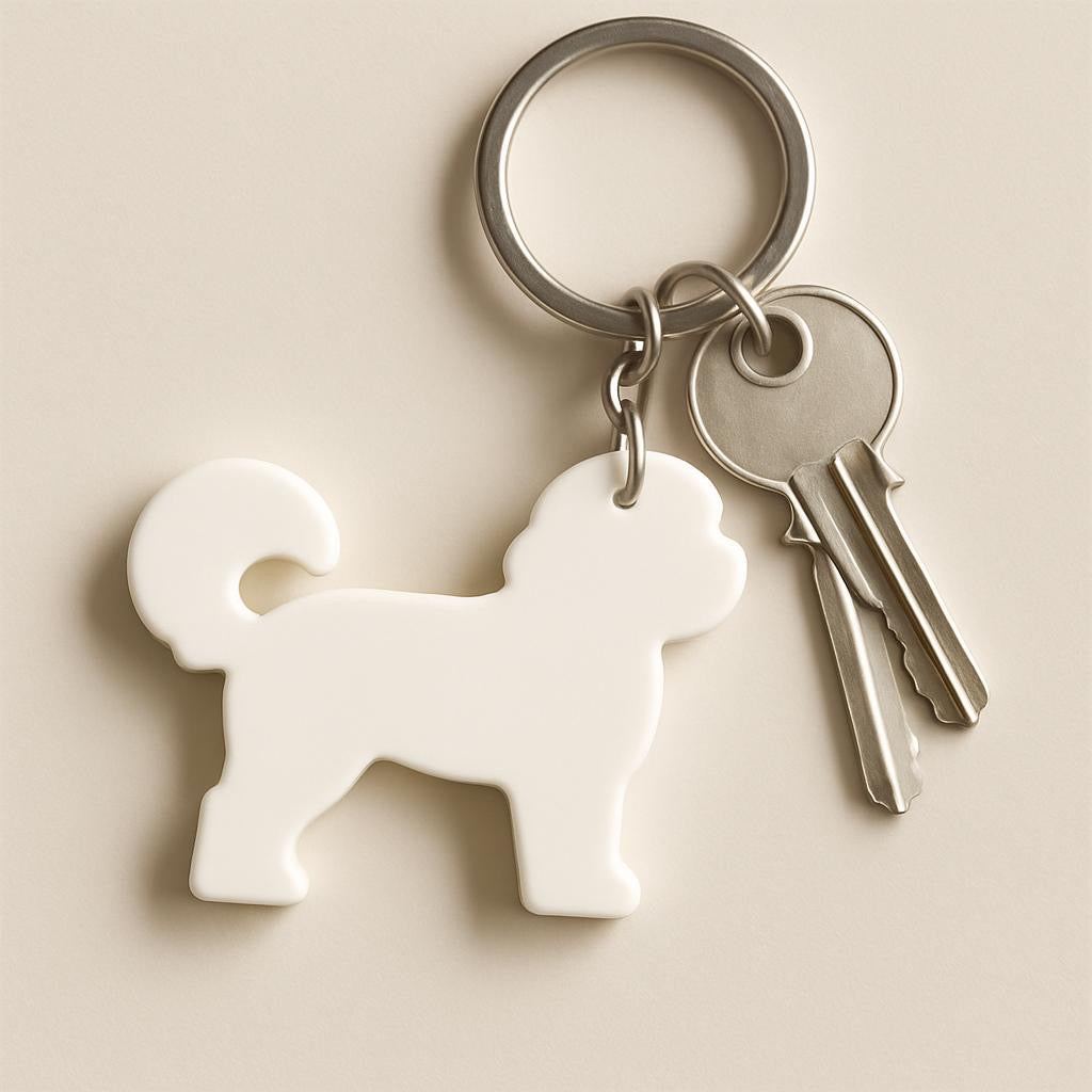 Keychain with a dog-shaped key holder on a beige background