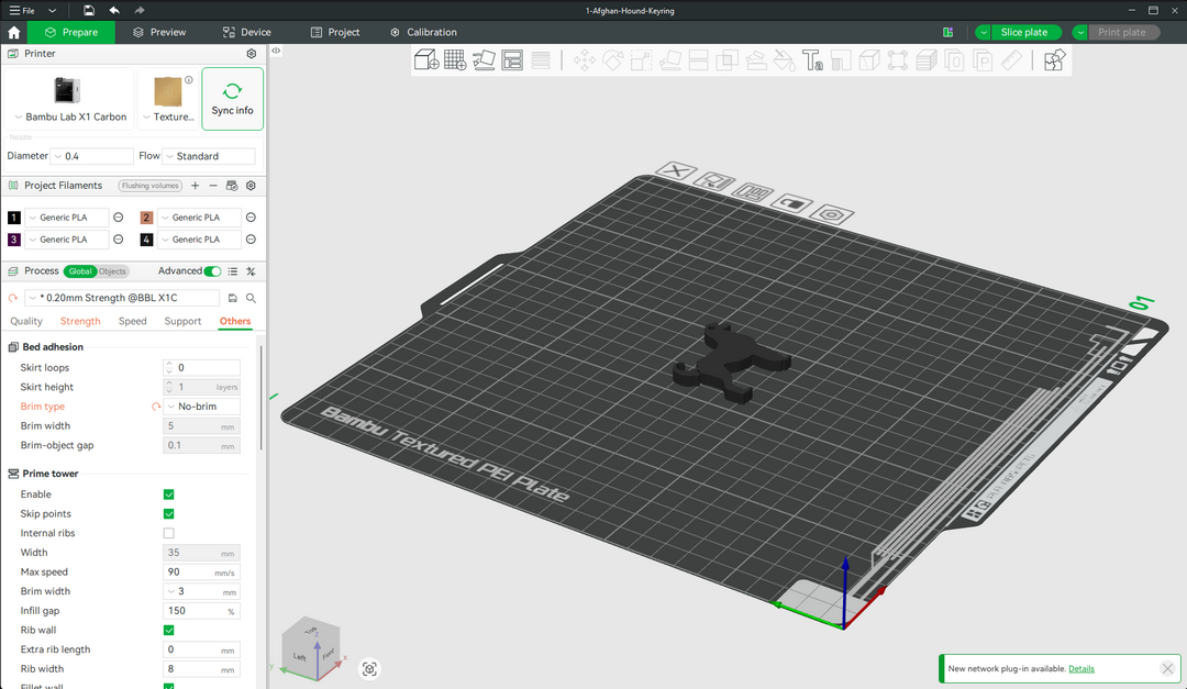 Afghan Hound keyring STL file shown loaded in Bambu Studio slicer on a textured PEI build plate for 3D printing.