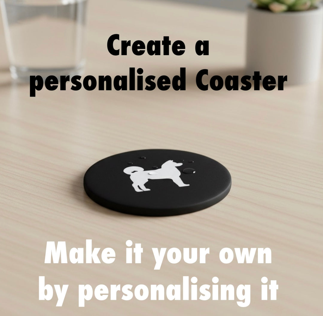 Akita 3D Printed Dog Coaster. Black coaster with a Akita dog  on a wooden surface, text promoting personalization.