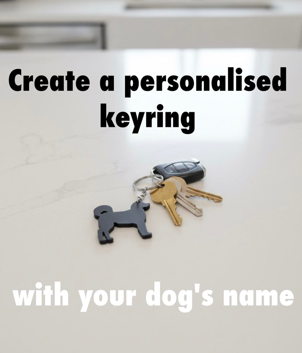 Akita 3D Printed Dog Keyring. Keychain with Akita key holder and keys on a white surface, text overlay promoting personalized keyring creation.