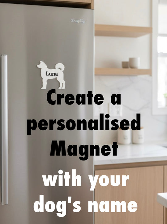 Akita 3D Printed Dog Magnet. Fridge with a personalised magnet of a Akita dog and text 'Create a personalised Magnet with your dog's name' in a kitchen setting.