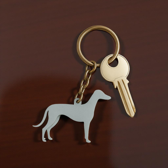 Keychain with a dog-shaped keyring and a key on a brown background