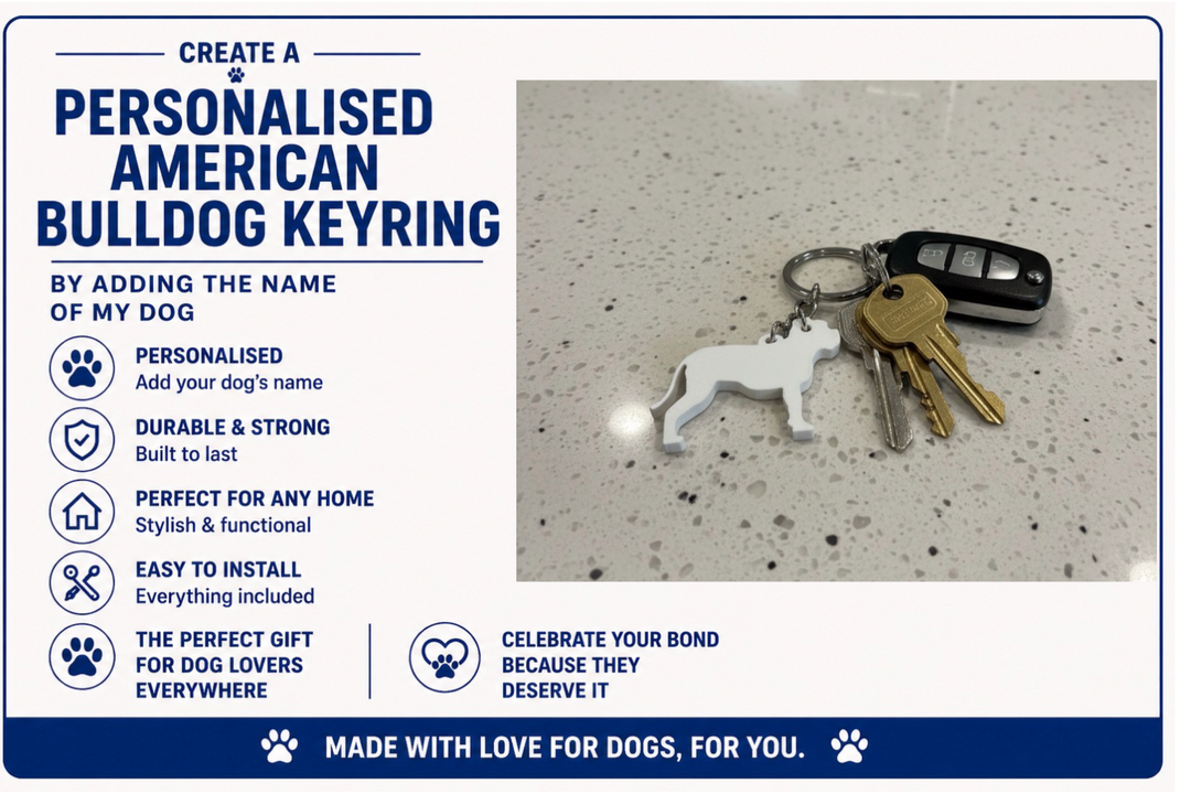 Personalised American Bulldog keyring with keys on a speckled surface