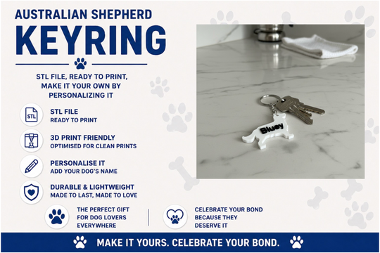 Australian Shepherd keyring with text on a marble surface